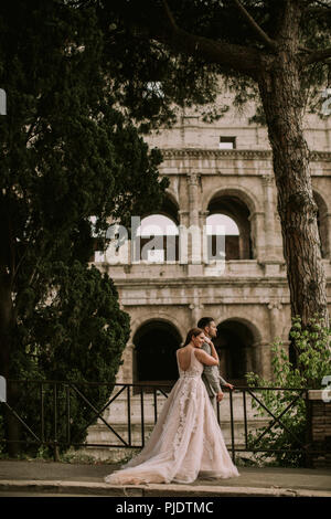 Wedding couple near Colosseum in Rome, Italy, Europe Stock Photo - Alamy