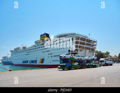 Piraeus, Greece - July 2, 2018. Cars and trucks boarding in a ferry at the Piraeus port. Attica region, Greece. Stock Photo
