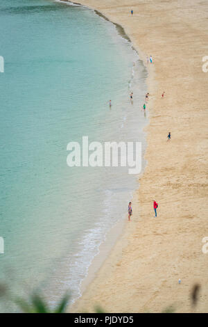 St. Ives, England -  June 2018 : People walking on the long and beautiful Porthminster  Beach, Cornwall, UK Stock Photo
