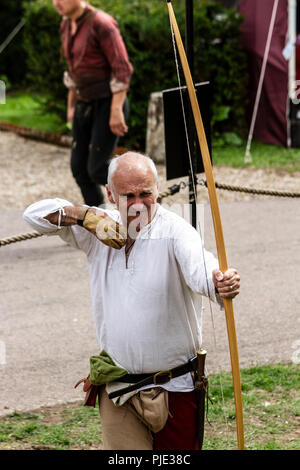 Archer in medieval dress Stock Photo