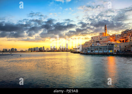 Jaffa Old Town and modern Tel Aviv skyline on dramatic sunrise, Israel Stock Photo