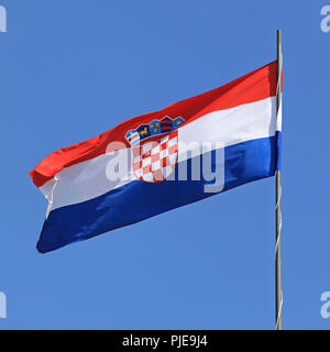 Croatian national flag flying at windy day Stock Photo