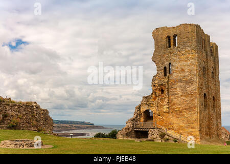 Dramatic cliff side landscape with Scarborough Castle in North Yorkshire. Stock Photo