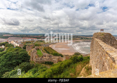 Dramatic cliff side landscape with Scarborough Castle in North Yorkshire. Stock Photo