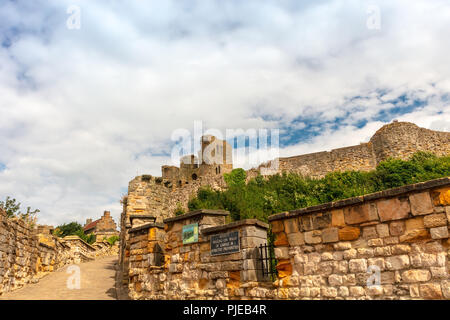 Dramatic cliff side landscape with Scarborough Castle in North Yorkshire. Stock Photo