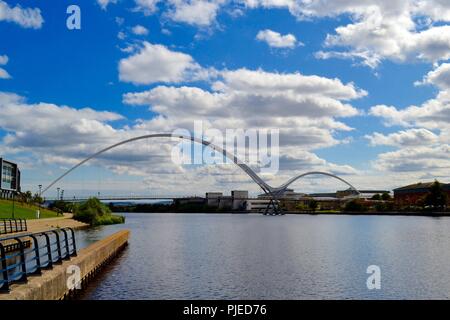 Striking, naturally lit image of the iconic Infinity Bridge spanning the River Tees in Stockton-on-Tees, UK Stock Photo