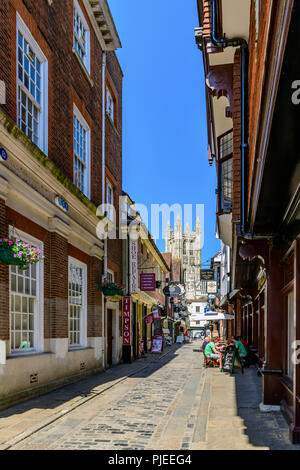 View of Canterbury cathedral tower along the narrow Butchery lane Stock Photo