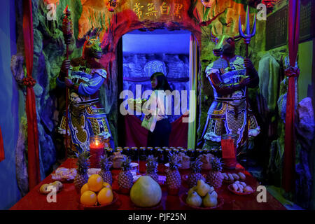 Chinese joss gold papers Stock Photo - Alamy