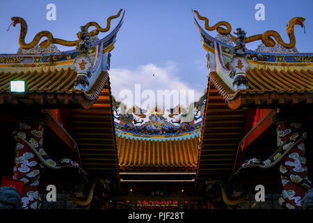 Kuala Lumpur, Klang, Malaysia. 26th Aug, 2018. A closer view of a Chinese style temple in Klang during the hungry ghost festival. Hungry ghost festival were celebrated at Malaysia on the 7th month of Chinese calendar by the Buddhist, Taoist and also since the Chinese ancient religion has believe the gate of hell will be open for the hungry ghost to seek food an entertainment on the world. According to their understanding the hungry ghost can emerge from neglect or desertion of ancestor and also from the violent and unhappy death. Usually the devotee families will offer prayers to their dece Stock Photo