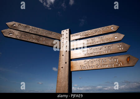 signs showing the various walks and mileage from Lynmouth, North Devon. Tarka trail, South West coastal path, two moors way, Coleridge way. Stock Photo