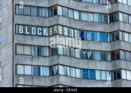 Block Brexit sign with the EU flag and Union flag in the windows of Arlington House, Margate, Kent, England, UK. Stock Photo