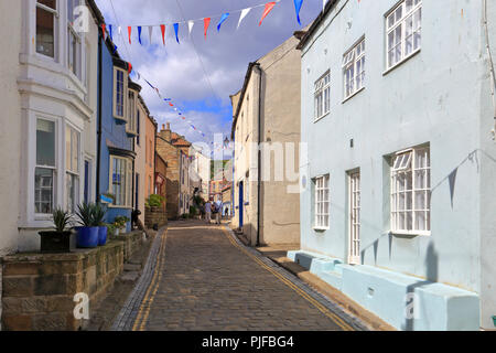 Staithes cobbled High Street, North Yorkshire, North York Moors National Park, England, UK. Stock Photo