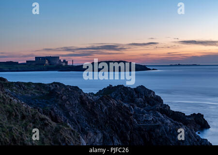 Wylfa nuclear power station at dusk, Anglesey on the North Wales coast Stock Photo