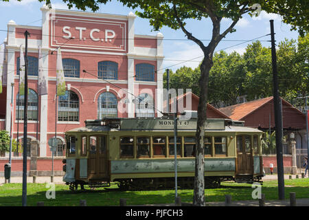 PORTO, PORTUGAL - JULY 20, 2017: Tourist tram of line between Ribeira and Foz neighborhoods stopped at the electric train museum. Next to Douro river Stock Photo