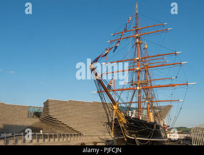 The historic sailing ship RRS Discovery with the new V&A Museum in the background at the Dundee waterfront in Tayside, Scotland Stock Photo