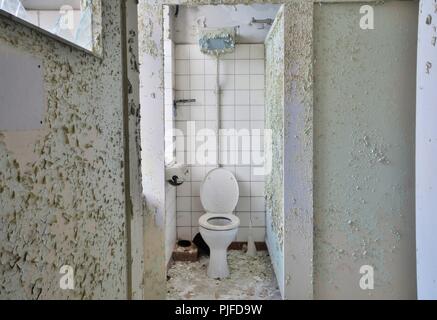 Toilet of a abandoned empty factory in Magdeburg Stock Photo