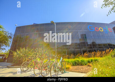 Mountain View, California, USA - August 13, 2018: Exterior of a Google headquarters building. Google technology company leader in internet services, online advertising, search engine, cloud computing. Stock Photo