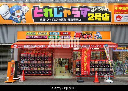 OSAKA, JAPAN - NOVEMBER 23, 2016: Toy store with capsule vending machines in Osaka. Japan is famous for its multitude of unusual vending machines. The Stock Photo