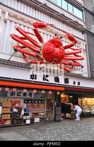 OSAKA, JAPAN - NOVEMBER 23, 2016: Crab decoration at a restaurant at Dotonbori street in Osaka, Japan. Dotonbori is the main entertainment area of Osa Stock Photo