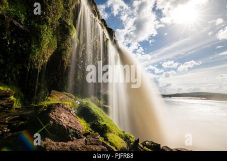 Big waterfall at Canaima Lagoon in Venezuela during a sunny day Stock Photo
