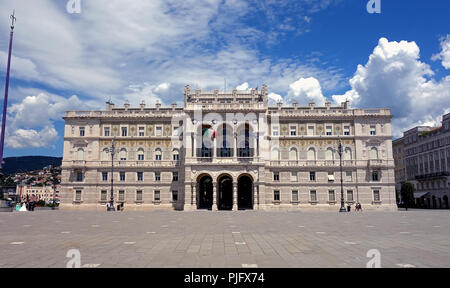 TRIESTE, ITALY - JULY 8 2018: people in front of Luogotenenza Austriaca Palace in Unity of Italy Square, The square is often said to be Europe's large Stock Photo