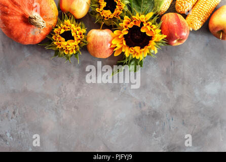Top view of autumn still life with pumpkin, apples, corn. Thanksgivin day. Stock Photo