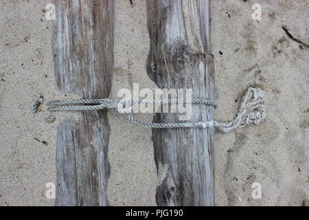 Rope around logs Stock Photo