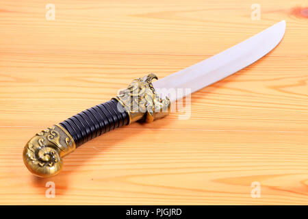 Traditional Oriental Mongolian Knife Dagger Carved Stock Photo