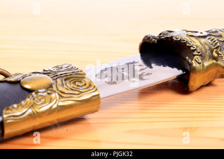 Traditional Oriental Mongolian Knife Dagger Carved Stock Photo