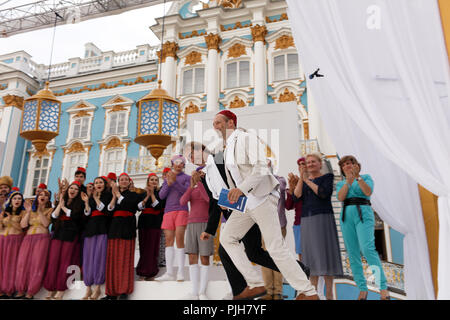 St. Petersburg, Russia - July 22, 2018: Conductor Fabio Mastrangelo (center left) and art-director of the fistival Victor Vysotsky after the final per Stock Photo