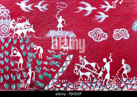 MUMBAI, INDIA – August 9 2018: Farming scenes (sowing, planting, ploughing) depicted on a mural at a Warli big-cat temple inside Sanjay Gandhi Nationa Stock Photo