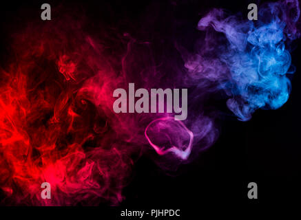 abstract shapes of mixed colors of blue and red smoke at dark background Stock Photo
