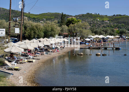 Beach at Vouliagmeni lake in Loutraki, Corinth, Greece Stock Photo