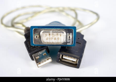 Old PC cables on a white table .. Com and lpt connectors for old computer stations. White background. Stock Photo