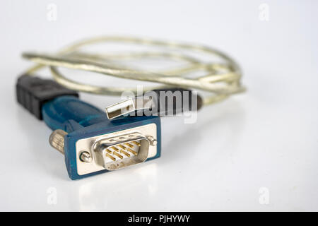 Old PC cables on a white table .. Com and lpt connectors for old computer stations. White background. Stock Photo