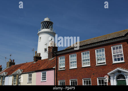 The Trinity House Lighthouse towers above local houses at Southwold, Suffolk, UK Stock Photo