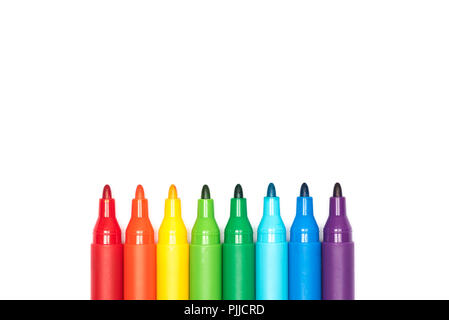 Neat row of colored felt tip marker pens on white background Stock Photo