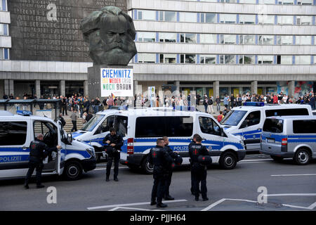 Chemnitz, Germany. 07th Sep, 2018. Demonstration of the right-wing populist alliance Pro Chemnitz: Police vehicles stand in front of the demonstration at the Karl Marx Monument. Credit: Hendrik Schmidt/dpa/Alamy Live News Stock Photo
