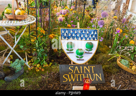 Winchester, Hampshire, UK. 7th Sep 2018. Thousands visit Illumination Festival of Flowers 5-9 September to see over 50,000 flowers and 400 different variations of flowers and foliage in Winchester Cathedral – the fragrance and colour evoking the senses as visitors wander round.   A stunning array of flower arrangements inspired by the magnificent Winchester Bible, the largest and finest surviving 12th century English Bible. Swithun was an Anglo-Saxon bishop of Winchester and subsequently patron saint of Winchester Cathedral. Credit: Carolyn Jenkins/Ģ����ý Live News Stock Photo