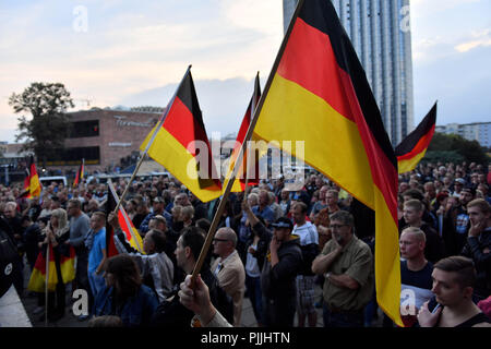 Chemnitz, Germany. 07th Sep, 2018. Demonstration of the right-wing populist alliance Pro Chemnitz: Participants waving German flags during the demonstration. Credit: Hendrik Schmidt/dpa/Alamy Live News Stock Photo