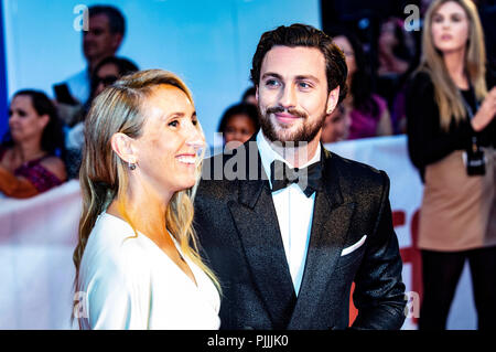Sam Taylor-Johnson and her husband Aaron Taylor-Johnson attending the premiere of 'Outlaw King' during the 2018 Toronto International Film Festival on September 6, 2018 in Toronto, Canada. Stock Photo
