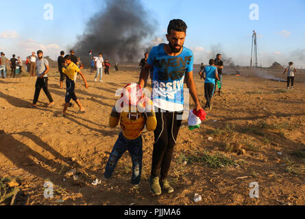 Gaza, Palestine. 7th Sep, 2018. Palestinian youth seen with a doll of US President Trump during the clashes.Clashes between the Israeli forces and Palestinian citizens during a protest against the decision of President Trump to recognizing Jerusalem as the capital of Israel. The protest was entitled: Return despite your nose Trump. Credit: Ahmad Hasaballah/SOPA Images/ZUMA Wire/Alamy Live News Stock Photo