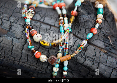 Background of colorful beaded necklaces made with traditional Romanian  glass bead Stock Photo by salajean