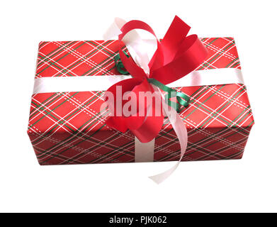Christmas present wrap with a decorative red and white bow Stock Photo