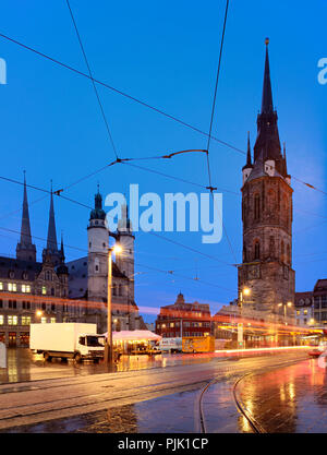Germany, Saxony-Anhalt, Halle (Saale), Market Square, market church and Red Tower, dusk, light trails of the tram Stock Photo
