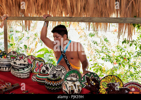 Chagres National Park, Panama - April 22, 2018: Native Embera people selling handcraft to tourists Stock Photo