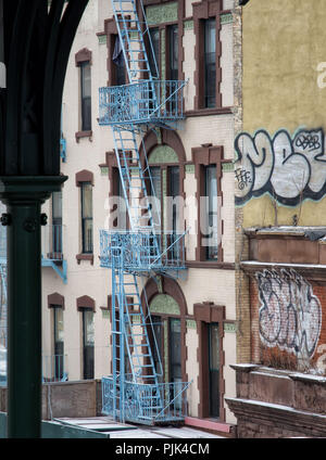 Fire exit stairs on typical New York brick buildings in Manhattan, New York City, USA Stock Photo