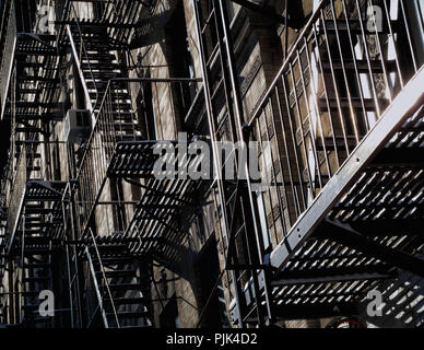 Fire exit stairs on typical New York brick buildings in Manhattan, New York City, USA Stock Photo