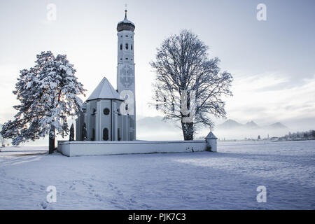 Germany, Bavaria, Allgäu, Schwangau, Church of Saint Coloman in winter Stock Photo