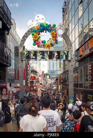 View of Takeshita-dori (Takeshita Street), a pedestrian shopping street lined with fashion boutiques, cafes and restaurants in Harajuku, Tokyo, Japan. Stock Photo
